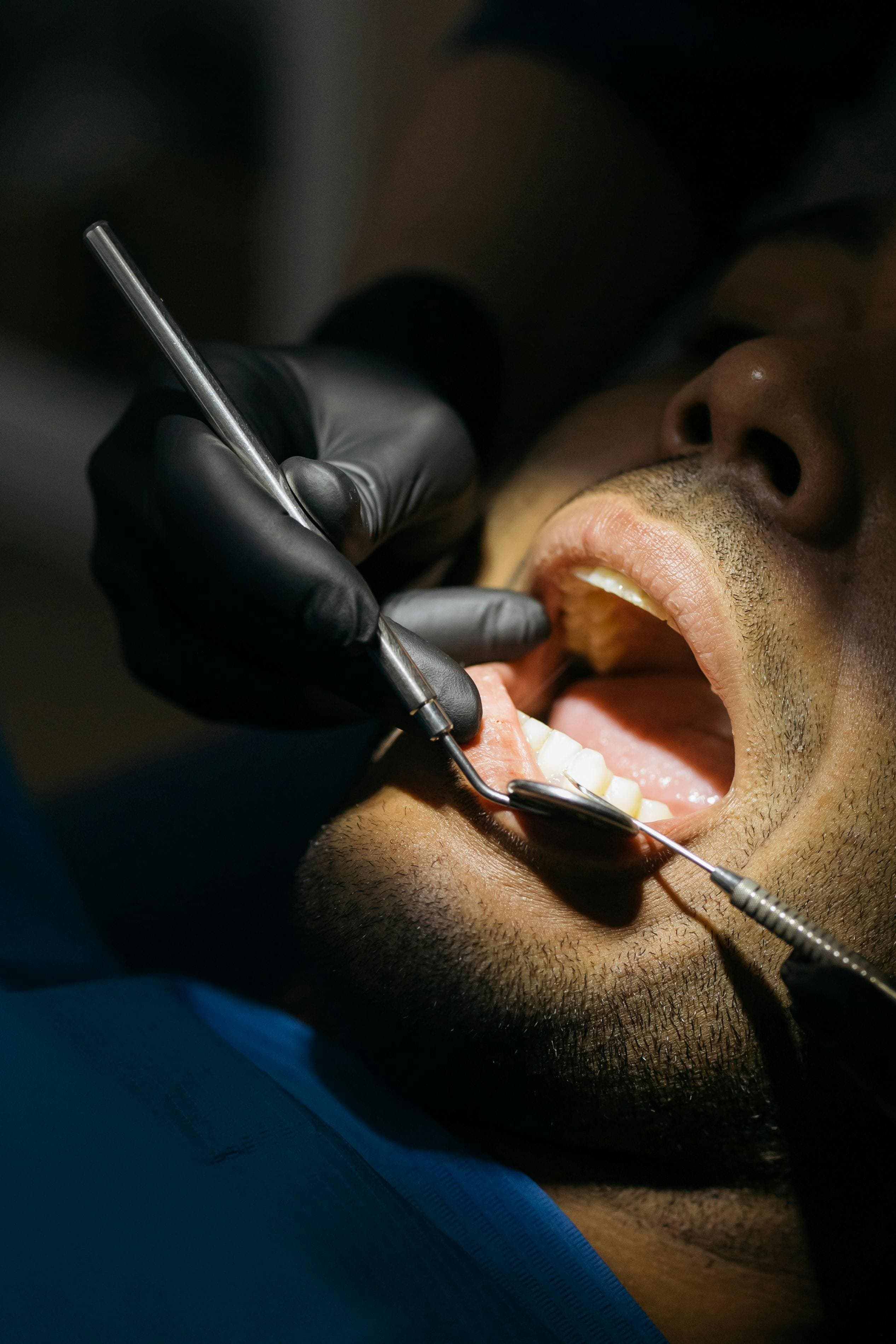 Dentist providing urgent dental care to a patient